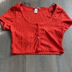 H and M red shirt.